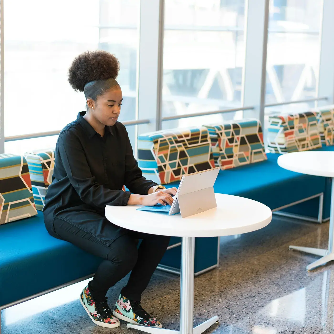 Woman working from airport